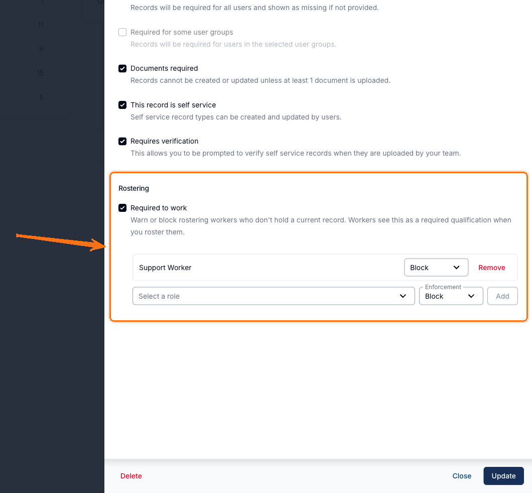 The lower half of the User Record Type drawer, with the Rostering section highlighted by an arrow. Required to work is ticked, described as "Warn or block rostering workers who don't hold a current record. Workers see this as a required qualification when you roster them." Below it a Support Worker row is set to Block with a Remove link, followed by an empty Select a role row with an Enforcement dropdown set to Block and an Add button.