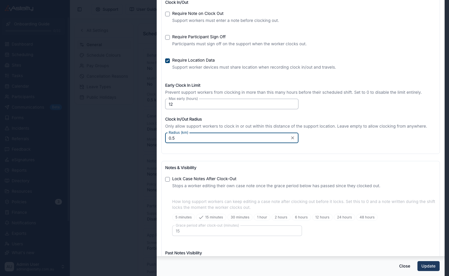 The Clock In/Out section of the Scheduling Settings drawer with Require Location Data ticked, Early Clock In Limit set to 12, and a Radius (km) field set to 0.5 under Clock In/Out Radius