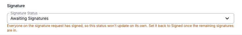 The Edit User Record drawer's Signature section with Awaiting Signatures selected over a completed request, showing the warning 'Everyone on the signature request has signed, so this status won't update on its own. Set it back to Signed once the remaining signatures are in.'